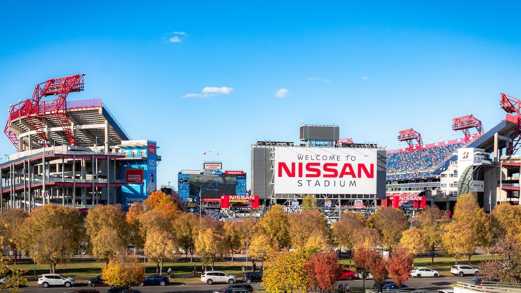 Nissan Stadium in Nashville, Tennessee with autumn foliage along the Cumberland River, home of the Tennessee Titans.